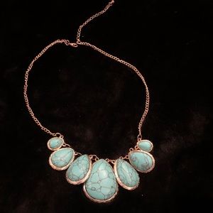 Gold necklace with turquoise beads